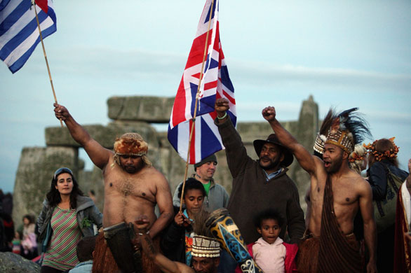 Stonehenge solstice: Revellers celebrate the summer solstice at Stonehenge near Amesbury