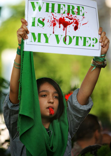 Protests about Iran: Bucharest, Romania: A demonstrator outside the Iranian Embassy