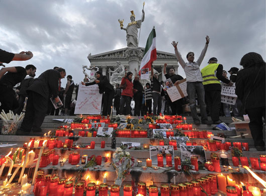 Protests about Iran: Vienna, Austria: Protestors light candles during a demonstration