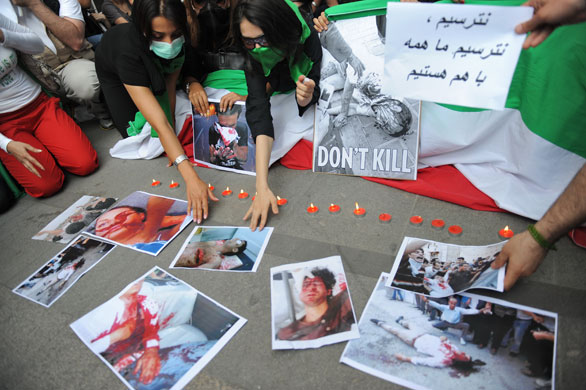 Protests about Iran: Istanbul, Turkey: Mousavi supporters display pictures