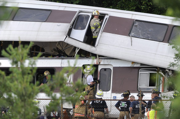 Washington Metro crash: Firefighters work to rescue victims after two trains collided