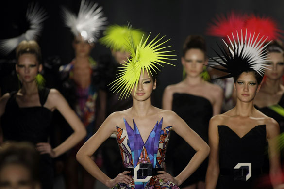 24 hours in pictures: Models wear creations by Andre Lima during the Sao Paulo Fashion Wee