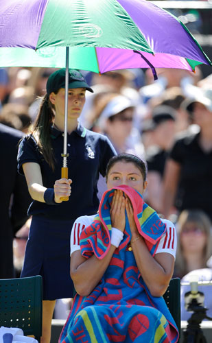 wimbledon: A pensive looking Dinara Safina sits in the shade 