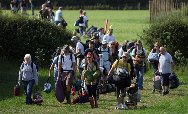 Glastonbury arrivals: Music fans start to arrive at the Glastonbury Festival site at Worthy Farm