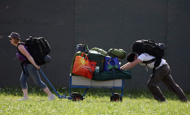 Glastonbury arrivals: Music fans start to arrive at the Glastonbury festival site at Worthy Farm