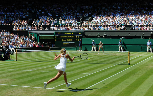 Wimbledon Wednesday: Maria Sharapova powers a forehand return back from the baseline
