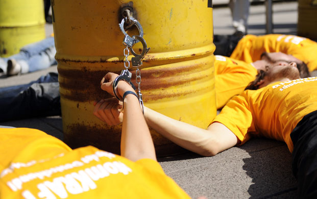 25 June 2009: Berlin , Germany: Greenpeace activists stage a protest 