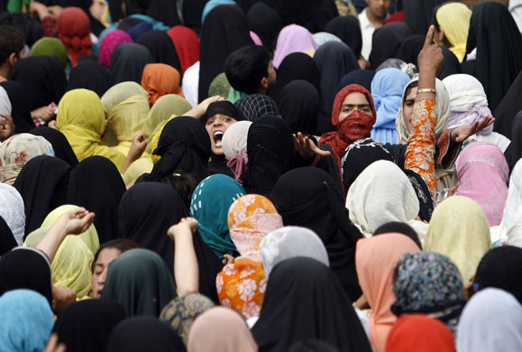 25 June 2009: Shopian, India: Protesters shout 'we want freedom' during a demonstration