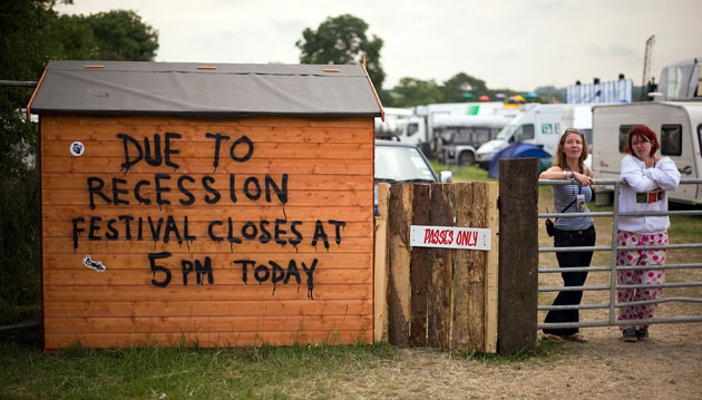 Glastonbury day two: Graffiti is pictured on a security hut  at Glastonbury festival 2009