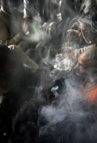 26 June 2009: Karachi, Pakistan: Addicts smoke hashish