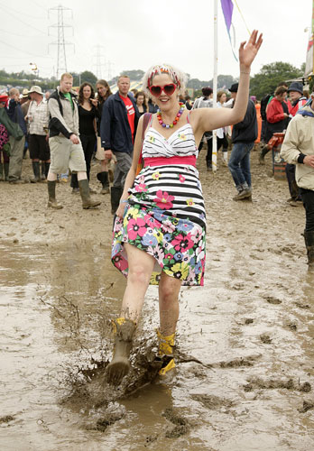 24 Hours: Glasto Weather: Glastonbury Festival 2009 mud young girl