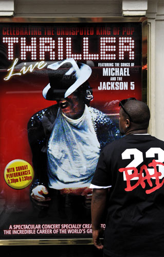 Michael Jackson reactions: A fan mourns the death of Michael Jackson outside the Lyric Theatre London