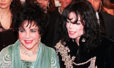 Elizabeth Taylor arrives with pop singer Michael Jackson at the Pantages 