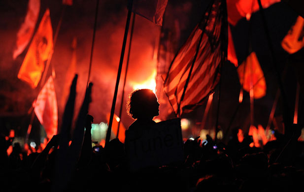 Bruce Springsteen: Festivalgoers watch Bruce Springsteen perform with the E Street Band