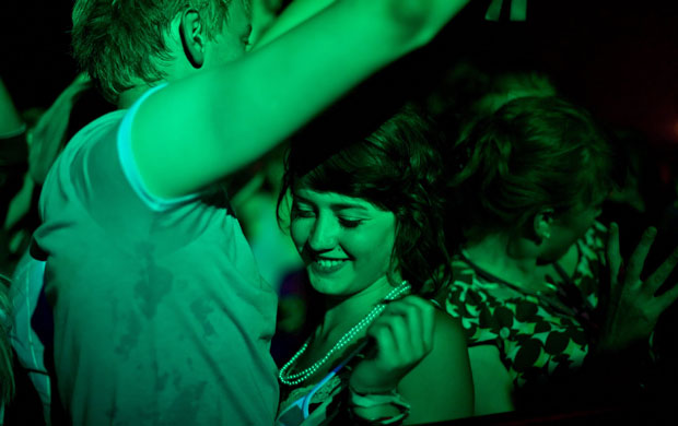 28 June 2009: A young couple in one of the dance tents at Glastonbury festival