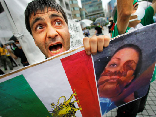 28 June 2009: Tokyo, Japan: An Iranian resident denounces Mahmoud Ahmadinejad
