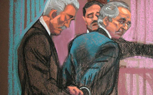 Bernard Madoff: Madoff handcuffed in court