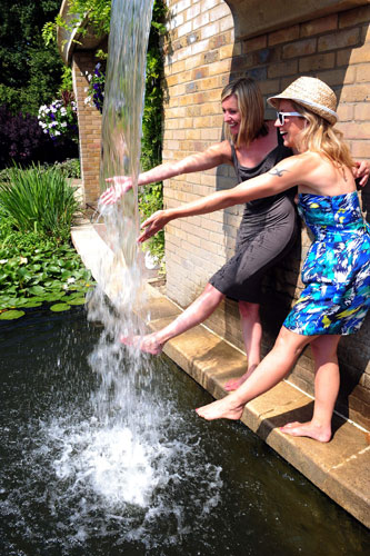Fans cool off at the Wimbledon Tennis Championships 