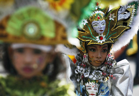 29 June 2009: Solo, Central Java: A model wearing an outfit made from batik cloth