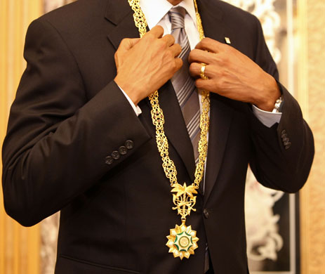 Obama in Saudi Arabia: President Barack Obama receives a gift from Saudi King Abdullah