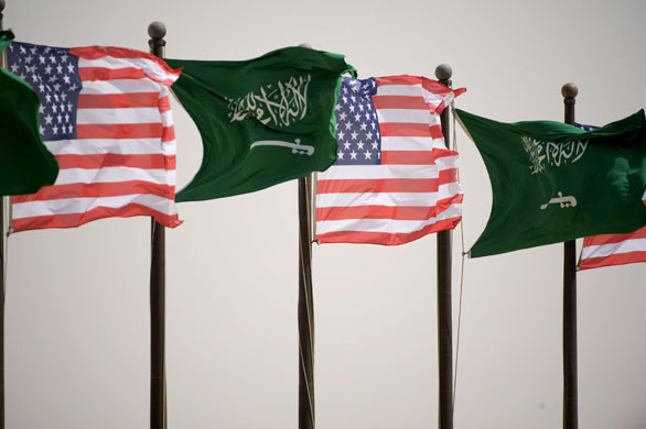 Obama in Saudi Arabia: US and Saudi flags fly at King Khalid International Airport