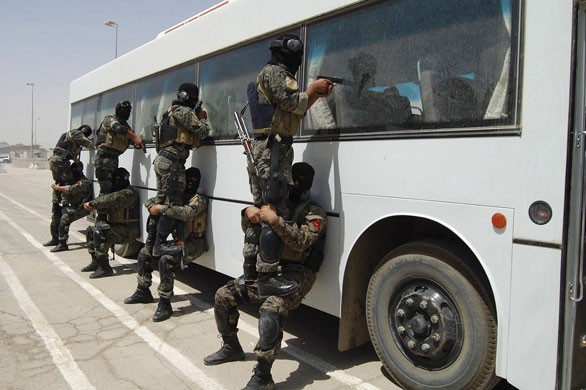 Iraqi army handover: Members of the Iraqi Special Forces demonstrate their capabilities
