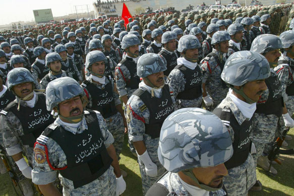 Iraq: A security officer parade in the southern city of Najaf