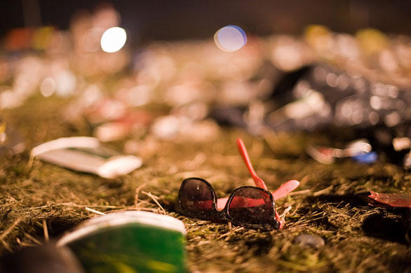 24 hours in pictures: Debris litters the site after the annual Glastonbury festival