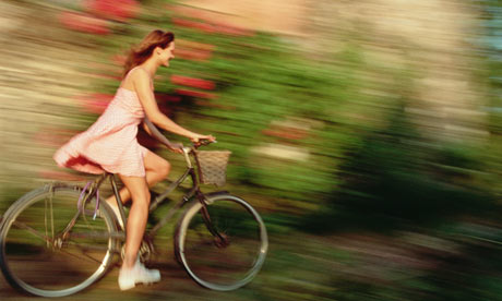 Bike Blog: A woman enjoying a bike ride with a dress