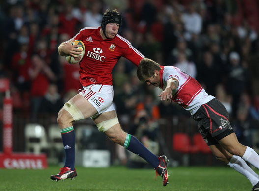 24sport: Stephen Ferris of the Lions holds off Michael Killian to score a try 