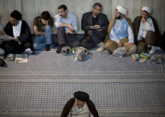 24 hours in pictures: Cleric prays while attending ceremony at mosque Tehran