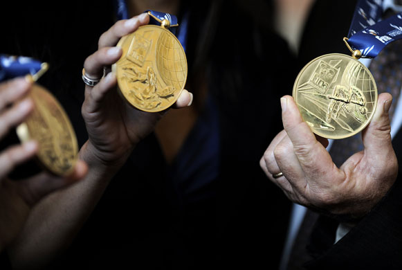 24 hours in pictures: Medals of the 13th swimming World Championships FINA