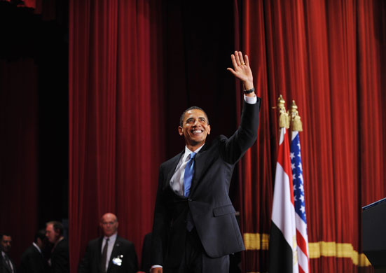 Obama in Egypt: President Barack Obama acknowledges applause at Cairo University 