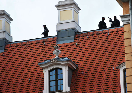 Obama in Germany: German police keep watch from the roof of a hotel near Dresden Castle