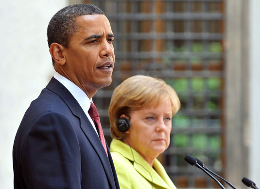 Obama in Germany: President Barack Obama speaks at a press conference with Angela Merkel