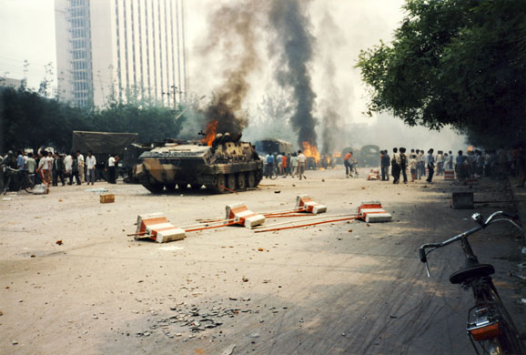 Tiananmen protests 1989: Armoured vehicles are set ablaze by civilians, Fuxing Road