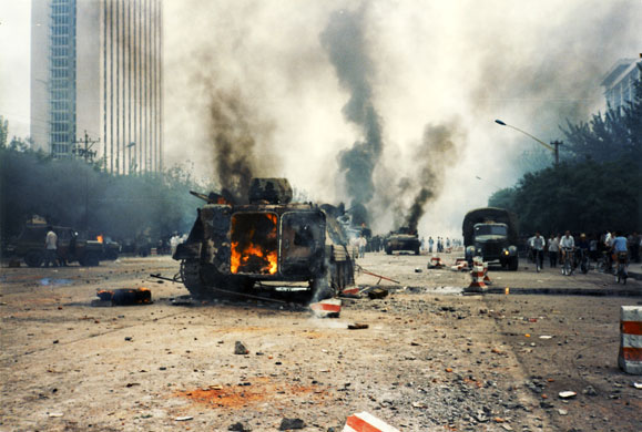 Tiananmen protests 1989: Armoured vehicles set on fire by civilians, West Changan Street, Muxudi 