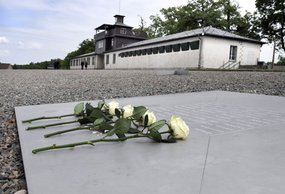 Obama in Germany: Four white roses on a commemoration plate at Buchenwald concentration camp