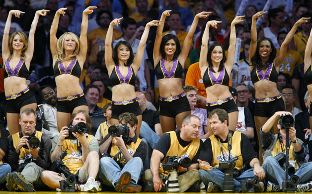 24 hours in pictures: Los Angeles Laker Girls perform behind photographers NBA Finals in LA