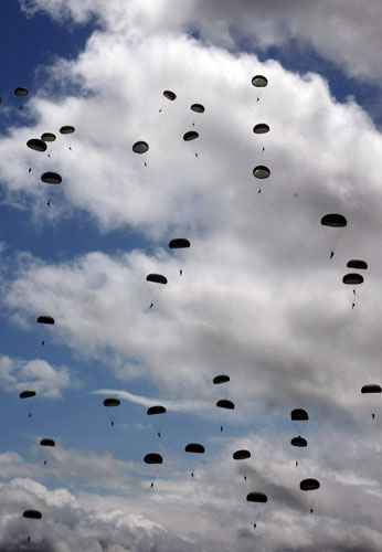 24 hours in pictures: paratroopers jump during the D-Day celebrations