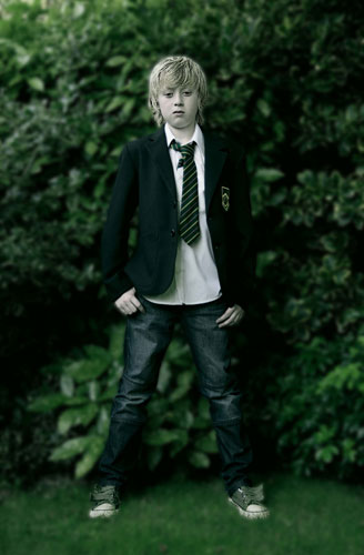 Michael Clough Portfolio: 'Will 2009' Portrait of a young boy in school uniform outside 