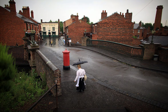 Heatwave: A tour guide braves a summer downpour at the Black Country Living Museum