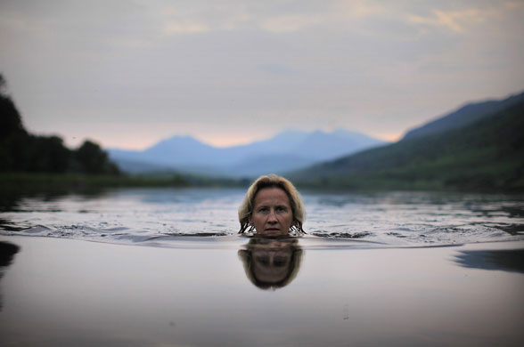 1 July 2009: Capel Curig, UK: Lady Alice Douglas swims in Llyn Mymbyr