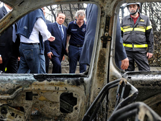 1 July 2009: Viareggio, Italy: Silvio Berlusconi visits the site of a train derailment