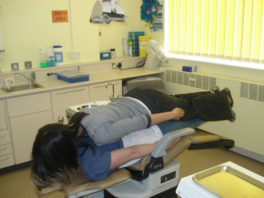 Facedown: Facebook lying down game at the dentist
