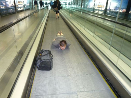 Facedown: Facebook lying down game on a conveyor belt