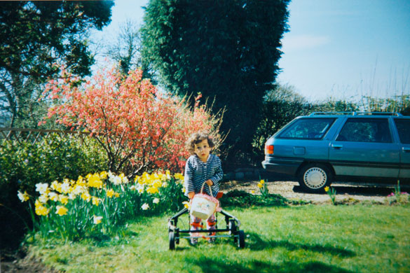 Nadia Clarke: A little girl in a sunny garden with a walking aid