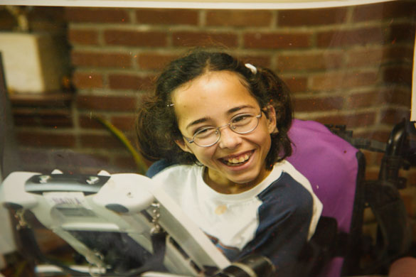 Nadia Clarke: A girl smiles by her customised computer keyboard