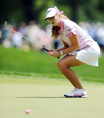 24 hours in sport: Paula Creamer of the US reacts to missing a putt