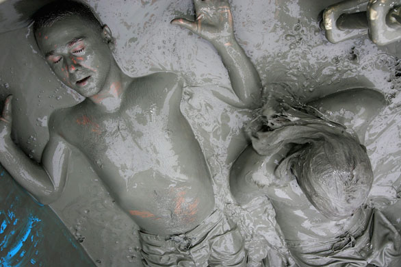24hours in pictures: Participants during the 12th Annual Boryeong Mud Festival South Korea